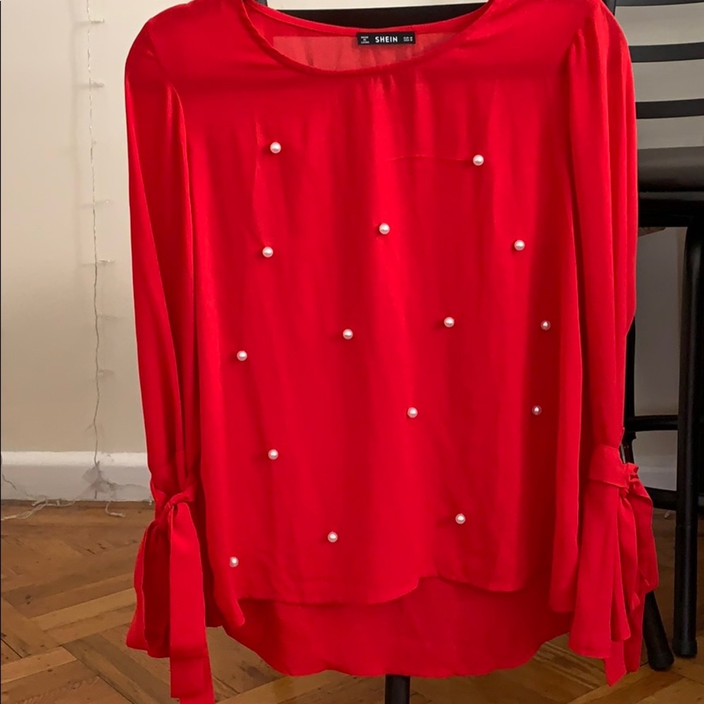 Red pearl embellished top